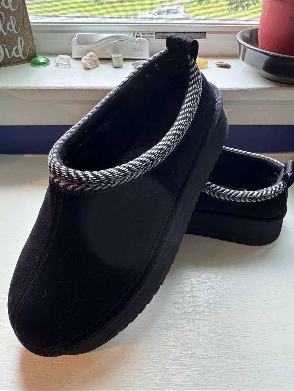 Koolaburra Black Slip-On with White Braided Trim